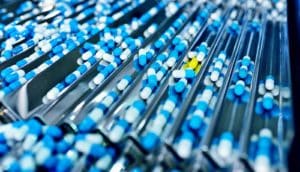 one yellow pill among blue ones