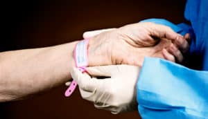 hospital bracelet on arm
