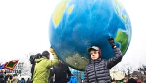 Paris Agreement protest with globe