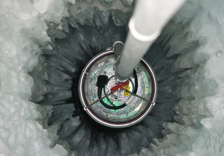 device in hole in ice