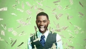 happy man surrounded by money