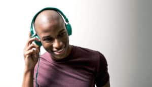 man in t-shirt listens