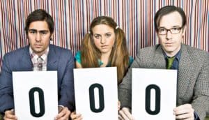 three judges with scorecards