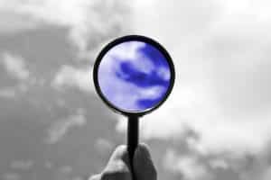 magnifying glass against sky