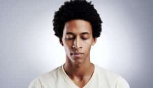 man with his eyes closed