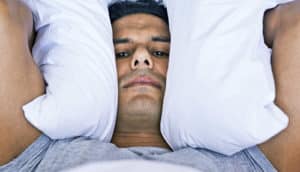 man upset to not get deep sleep