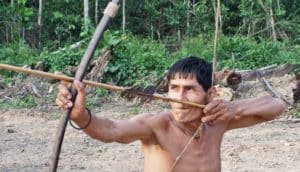 Tsimane man with bow and arrow