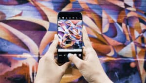 android phone taking picture of colorful wall