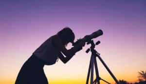 amateur astronomer with telescope