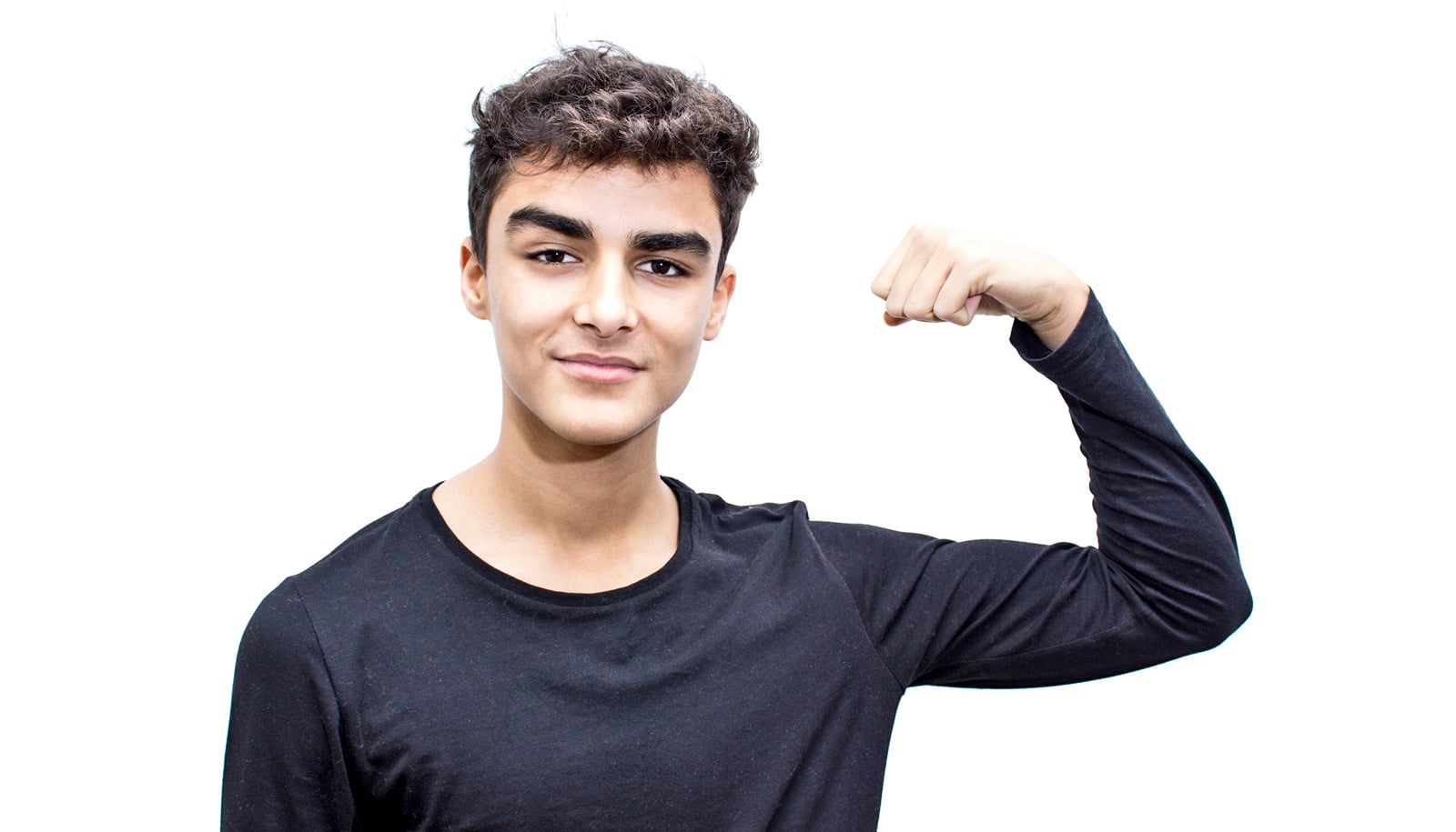 teen boy flexes arm