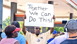 man with sign at Ferguson protest