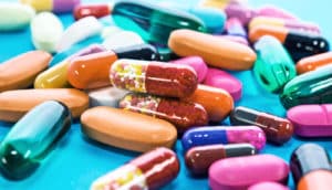 pills on a blue background