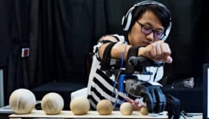 test subject uses prosthetic hand