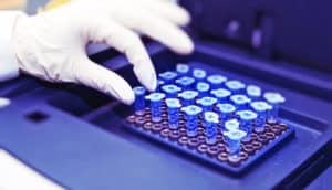 vials in purple centrifuge