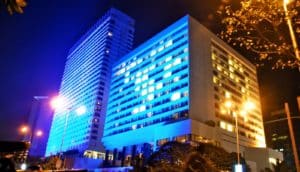 building with lights on at night