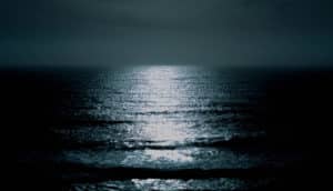 light on dark ocean