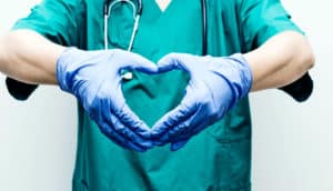 doctor making heart with hands