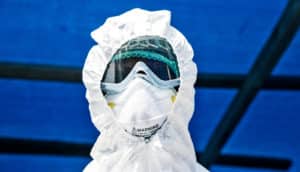 man in Ebola safety gear