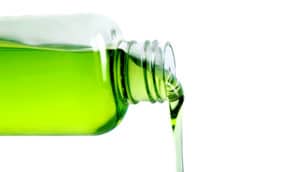 green shampoo pouring