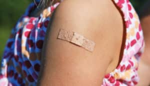band-aid on child's arm