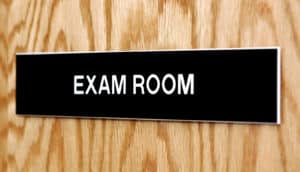 exam room sign on door