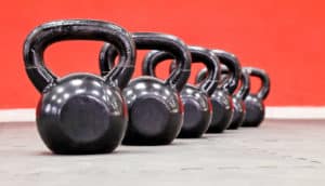 kettlebells on red