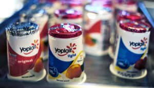 yogurt containers in a fridge
