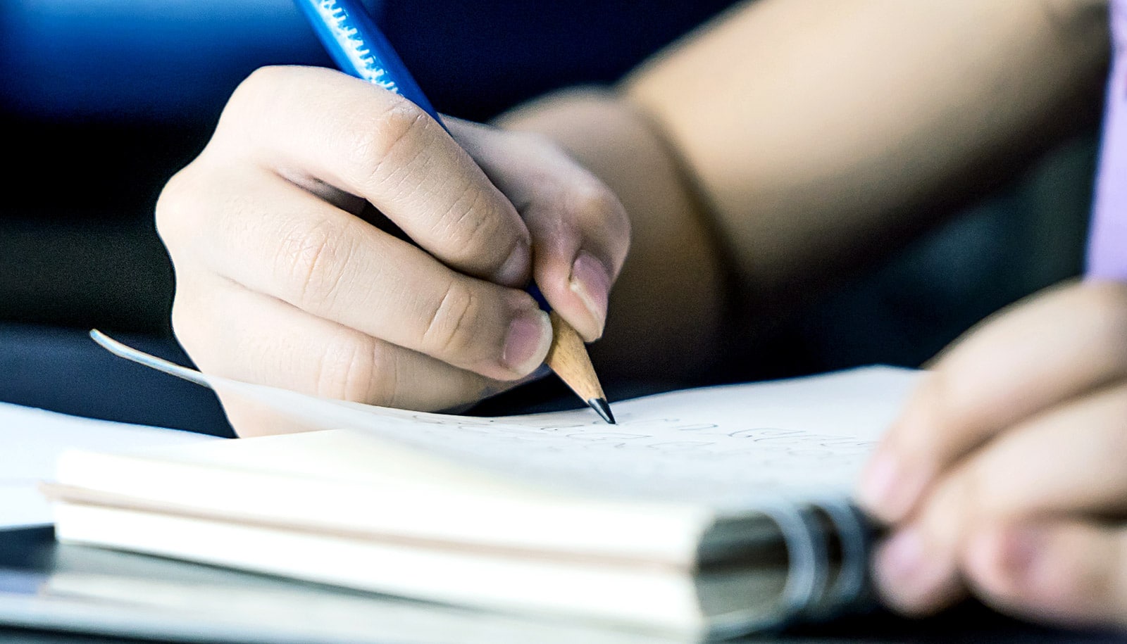 young child writing