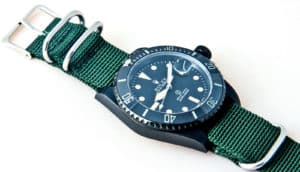 green rolex watch on white