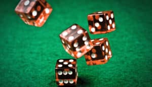 red dice on green felt
