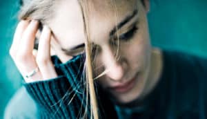 woman in green sweater