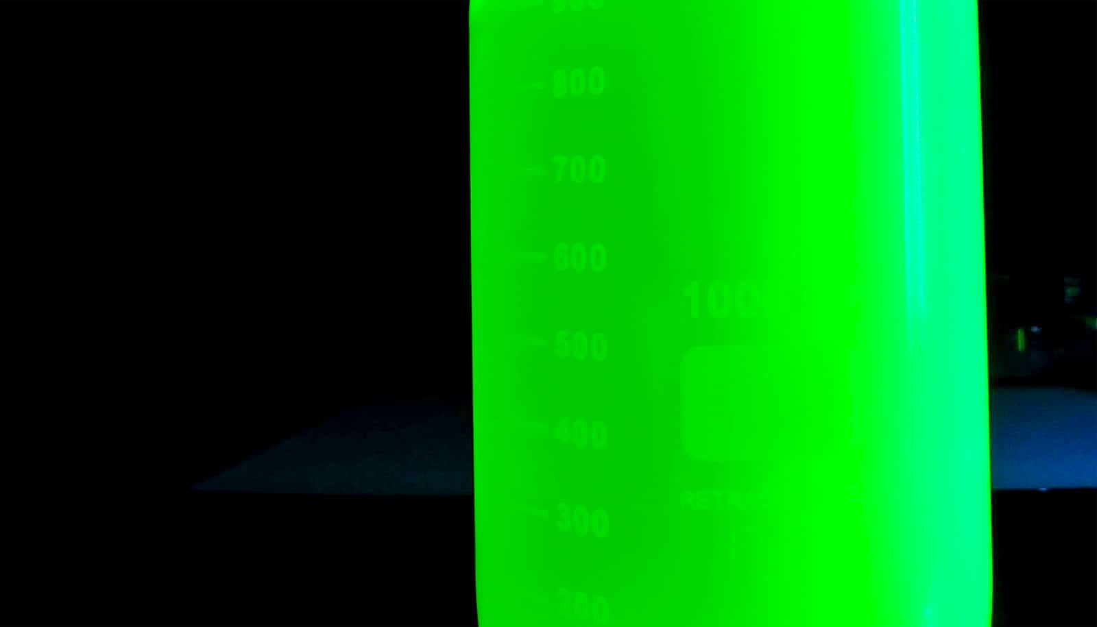 ultra-pure green in lab container