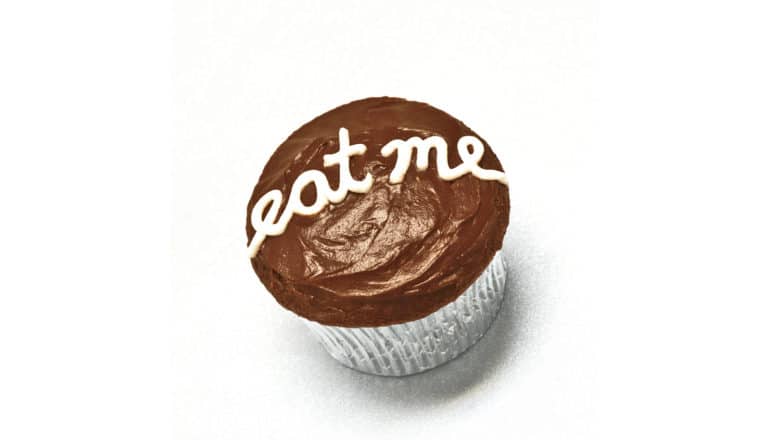 eat me written on cupcake