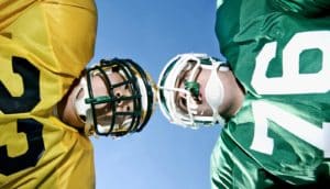 football players face off