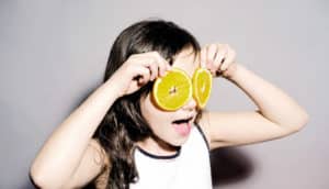 girl with orange slice eyes