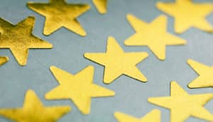 gold stars on gray (teacher evaluations concept)