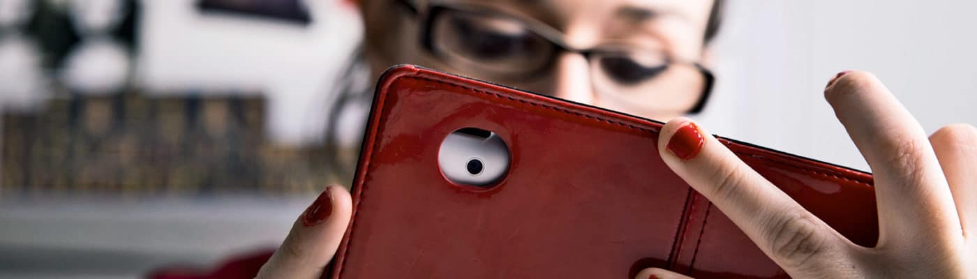 reading social media on phone