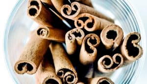 cinnamon sticks in a cup