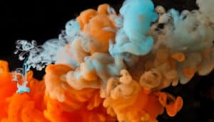 orange and blue dye underwater