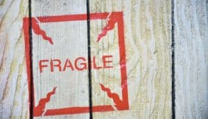 fragile stamp on wood crate (Fragile X Syndrome concept)