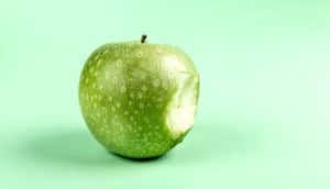 bite out of green apple
