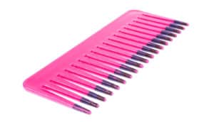 pink comb on white