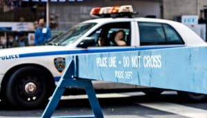 police barricade in front of car