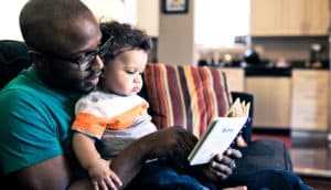 reading with baby (learning, infants, books concept)