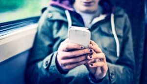 smartphone on the train (Twitter concept)