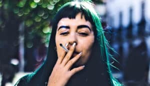 smoking woman with green hair (smoking cigarettes)