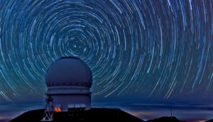 swirling stars (black holes + cosmic photobomb)