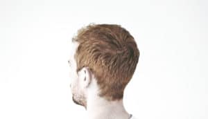 back of redheaded man's head