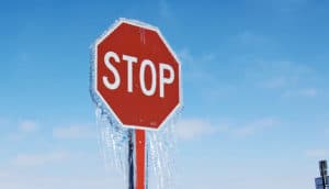 frozen stop sign (geoengineering and climate change concept)