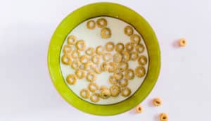 nearly empty cereal bowl (overeating concept)
